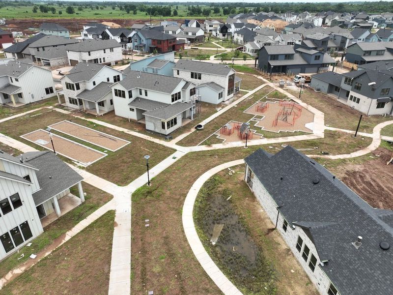 Aerial view of the Indigo community in Richmond, TX, showing layout and nearby surroundings (Image 11).