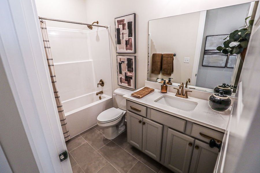 Furnished interior in a model home at Walker Farms in Bartlett (Image 39).