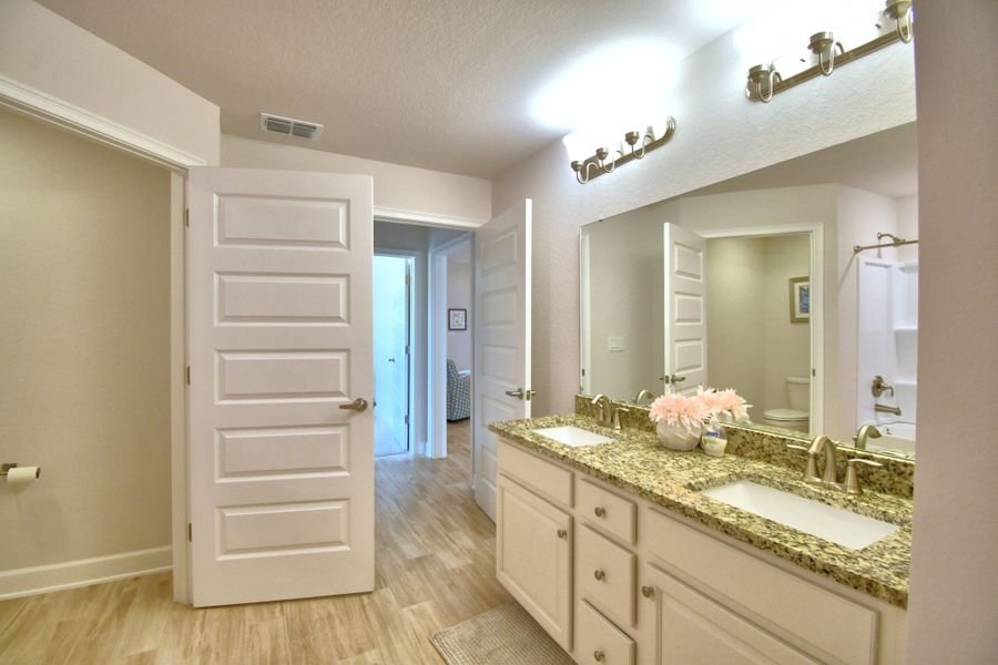 Furnished interior in a model home at Citrus Landing in Davenport (Image 23).