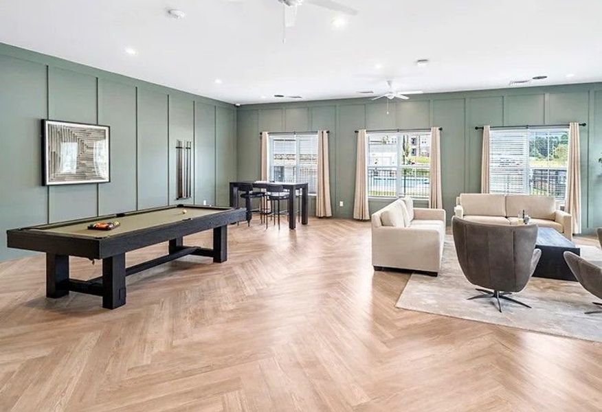 The neighborhood clubhouse is designed for downtime, from pool tables to comfortable lounge seating The neighborhood clubhouse is designed for downtime, from pool tables to comfortable lounge seating