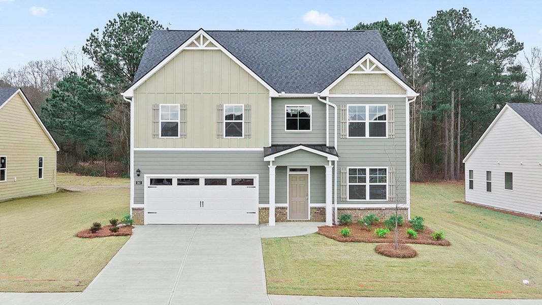 Front exterior of a home in the Locust Grove Station - Cedar Ridge community, located in Locust Grove, GA (Image 15).