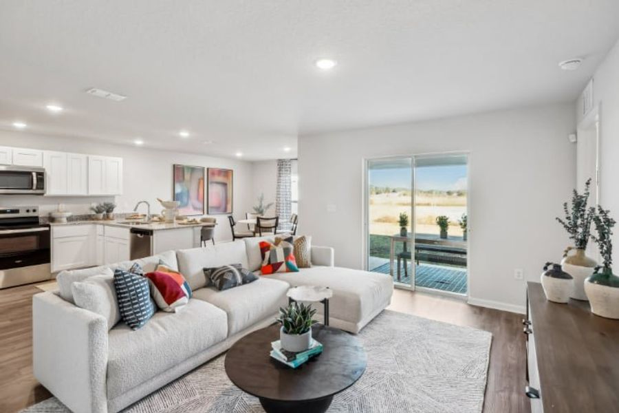 A living room with a large window.