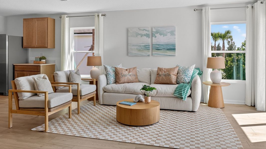 Furnished interior in a model home at Sawmill Branch Express in Palm Coast (Image 7).