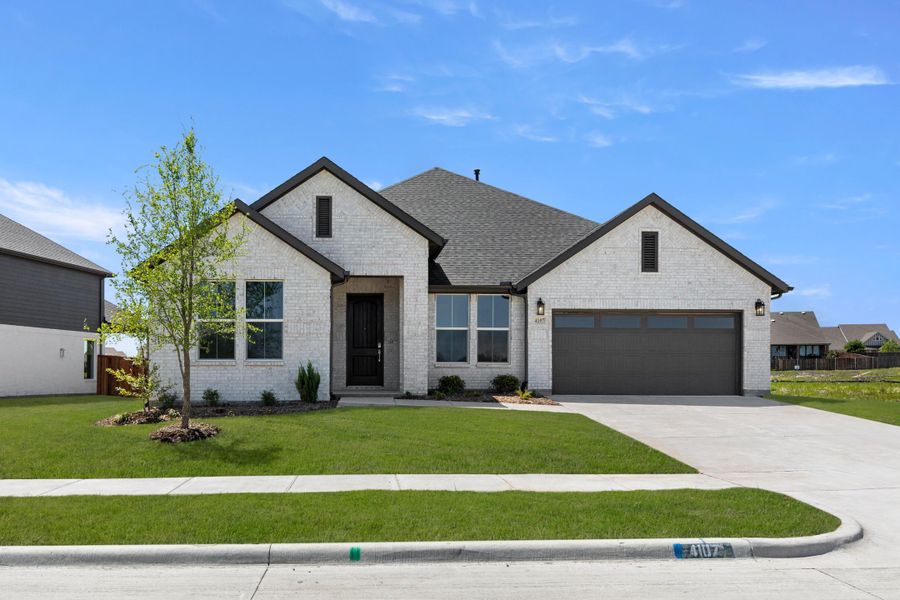 Front exterior of a home in the Somerset Park community, located in Rockwall, TX (Image 3).