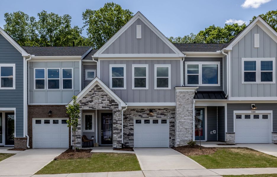 Front exterior of a home in the Townes at Chatham Park community, located in Pittsboro, NC (Image 10). Front exterior of a home in the Townes at Chatham Park community, located in Pittsboro, NC (Image 10).