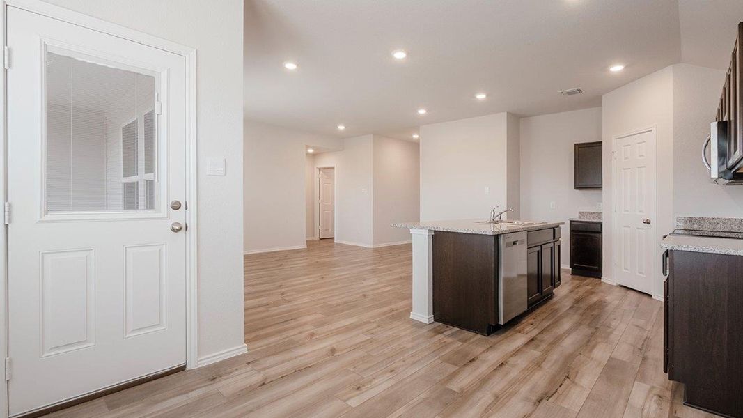 Furnished interior in a model home at The Villages at Schwertner Ranch in Jarrell (Image 23).