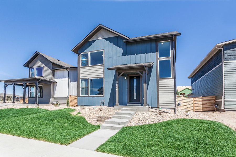 Front exterior of a home in the Trailside community, located in Timnath, CO (Image 21).