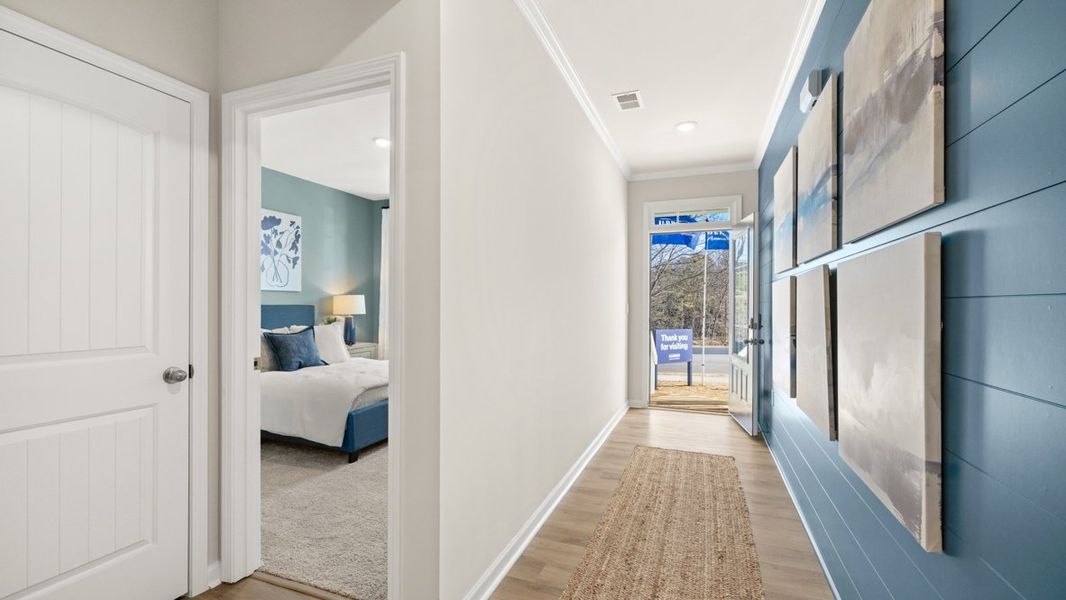 Furnished interior in a model home at Liberty Crossing in Braselton (Image 6).