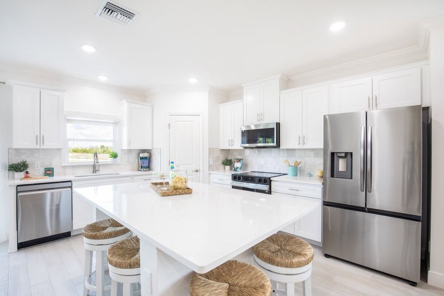 Furnished interior in a model home at Orchid Cove in Bokeelia (Image 4).