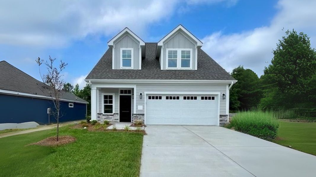 Front exterior of a home in the The Landing at Sycamore Creek community, located in High Point, NC (Image 10).