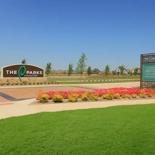 Entrance to the The Parks at Wilson Creek community in Celina, TX, featuring signage and landscaping (Image 2).