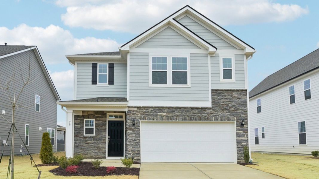 Front exterior of a home in the The Farm at Neill's Creek community, located in Lillington, NC (Image 12). Front exterior of a home in the The Farm at Neill's Creek community, located in Lillington, NC (Image 12).