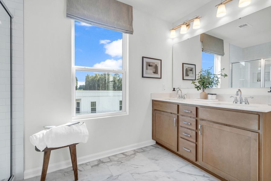 Furnished interior in a model home at Reeves Crossing in St. George (Image 22).