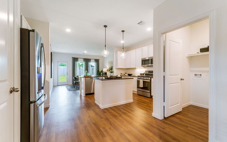 Furnished interior in a model home at The Pines at Seven Coves in Willis (Image 22).