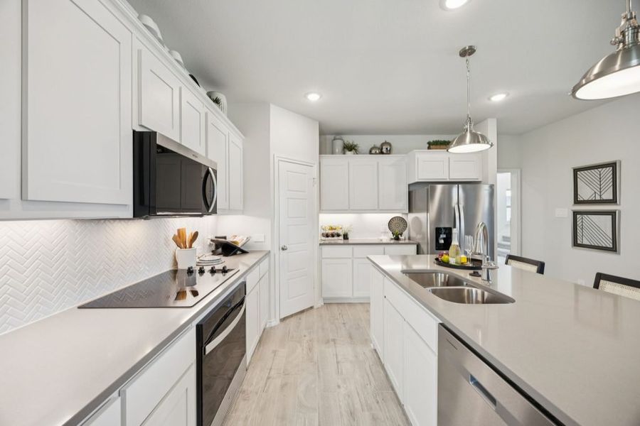 Furnished interior in a model home at Churchill in Anna (Image 9).