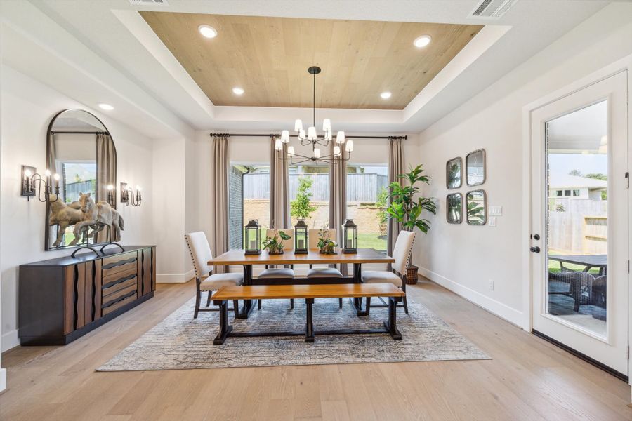 Furnished interior in a model home at The Woodlands Hills – 65' in Willis (Image 6).
