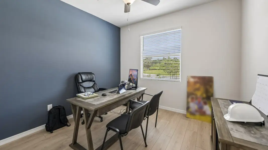 Furnished interior in a model home at Gladstone Park Villas in Sarasota (Image 16).