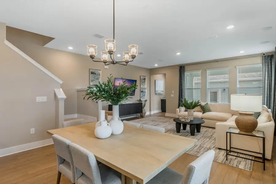 Furnished interior in a model home at Harvest at Ovation - Townhomes in Winter Garden (Image 54).