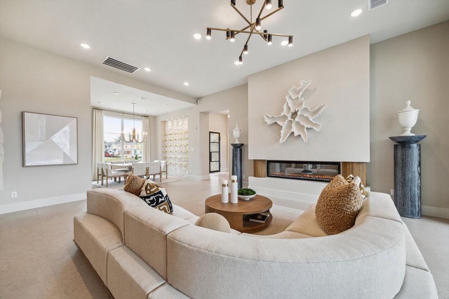 Furnished interior in a model home at ARTAVIA® - 65' Art in Conroe (Image 12).