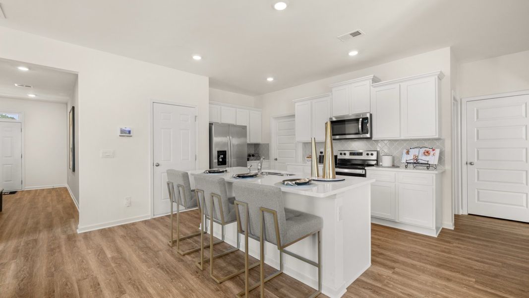 Furnished interior in a model home at Shoal Creek in Hampton (Image 5).