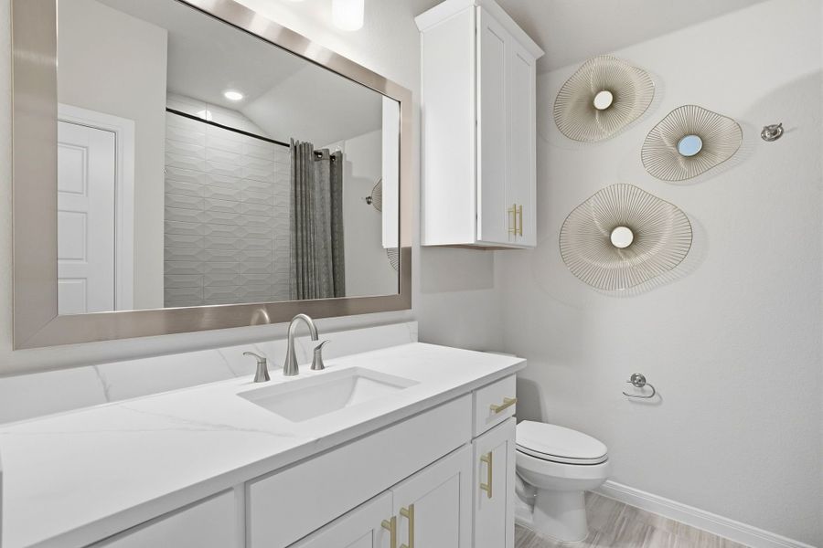 Furnished interior in a model home at Lily Creek at Sutton Fields in Aubrey (Image 59).