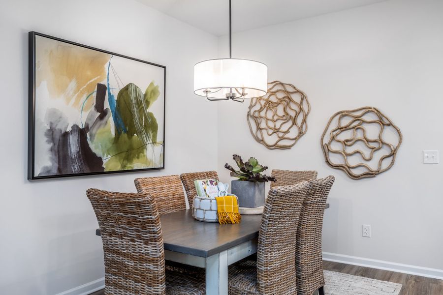 Furnished interior in a model home at Coastal Haven Townes in Leland (Image 6).