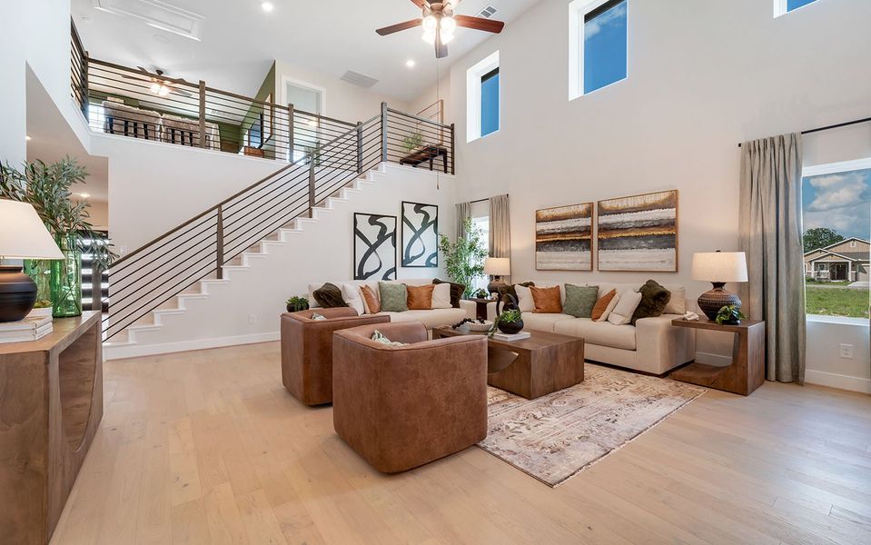 Furnished interior in a model home at Grande Estates in Bertram (Image 8).