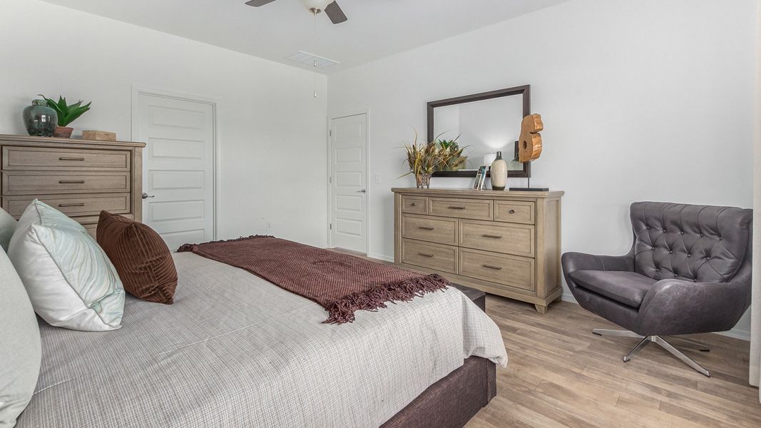 Furnished interior in a model home at Roadrunner Estates in Tucson (Image 25).
