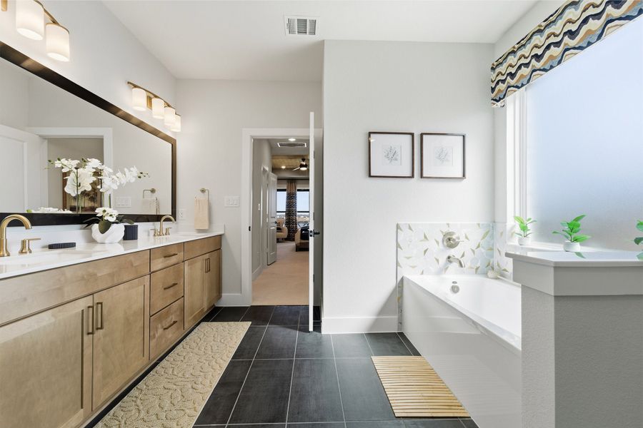 Furnished interior in a model home at Lariat in Liberty Hill (Image 41).