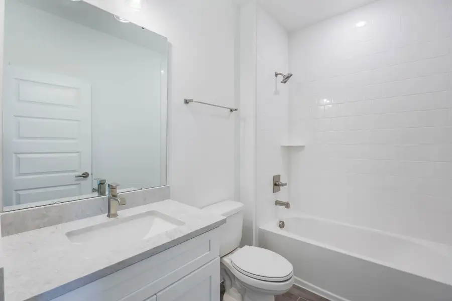 Furnished interior in a model home at Harvest at Ovation - Townhomes in Winter Garden (Image 67).