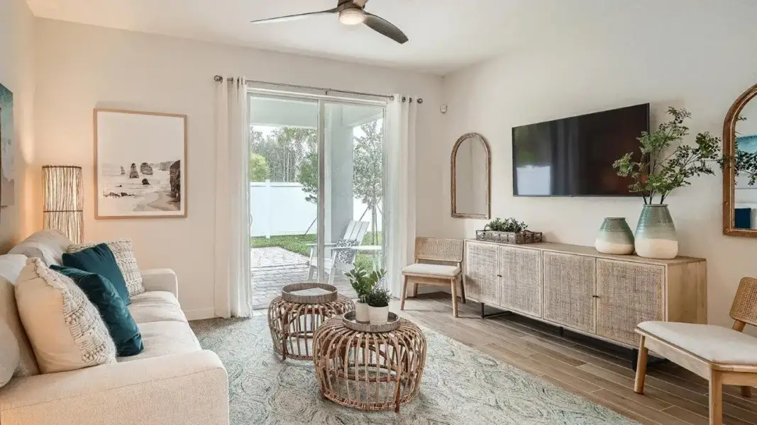 Furnished interior in a model home at Limestone Reserve in Jupiter (Image 7).