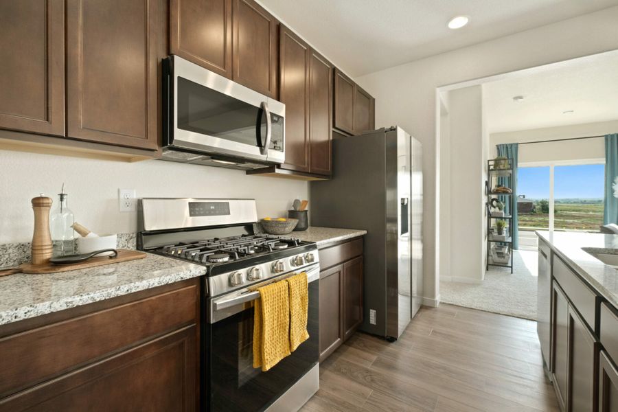 Furnished interior in a model home at Lochbuie Station in Lochbuie (Image 4). Furnished interior in a model home at Lochbuie Station in Lochbuie (Image 4).