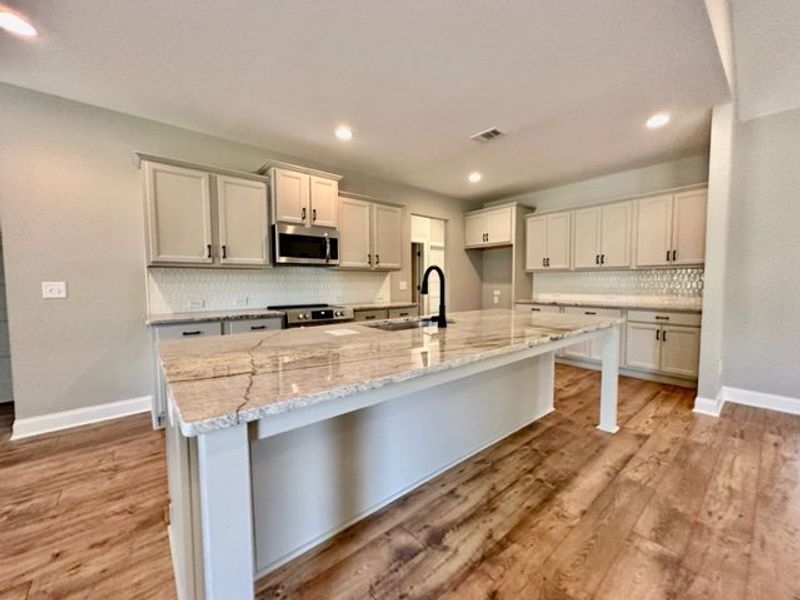 Furnished interior in a model home at Polk Place in Moreland (Image 6).