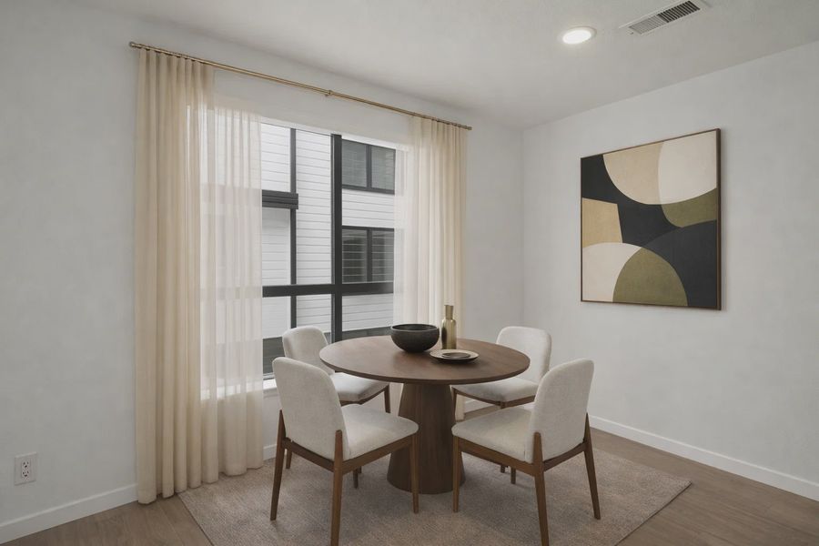 Furnished interior in a model home at The Hub at Virginia Village in Denver (Image 16).