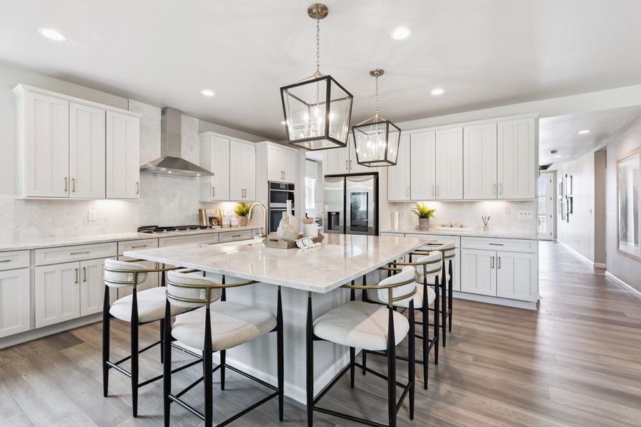 Furnished interior in a model home at Highlands Preserve in Mead (Image 5).