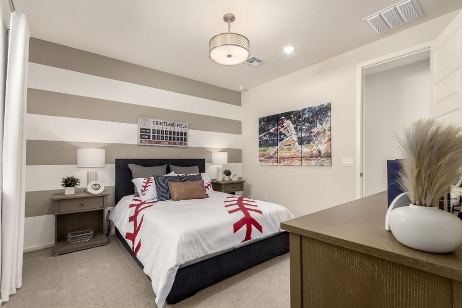 Furnished interior in a model home at Agave Springs at Teravalis in Buckeye (Image 27).
