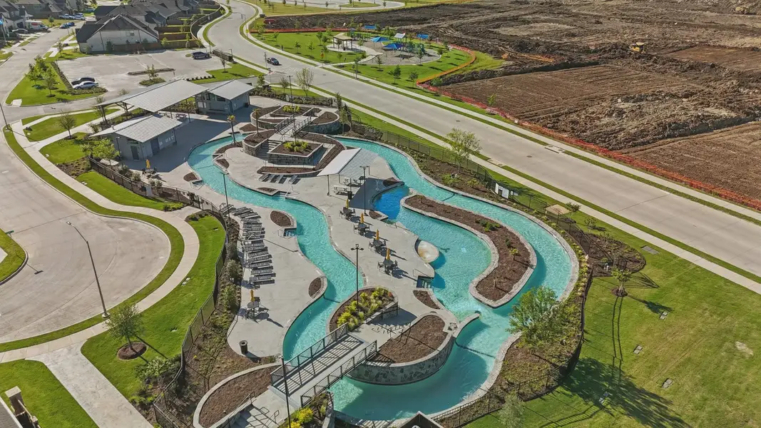 Experience modern luxury with this sculptural lazy river, set in the refined Wildflower Ranch, Texas. Experience modern luxury with this sculptural lazy river, set in the refined Wildflower Ranch, Texas.