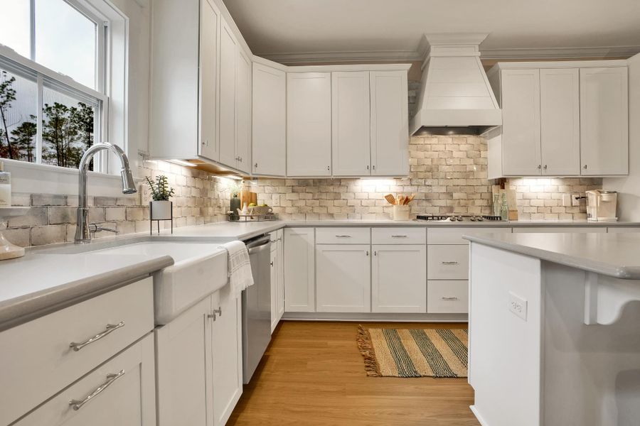 Furnished interior in a model home at Carolina Creek in Hampstead (Image 15).