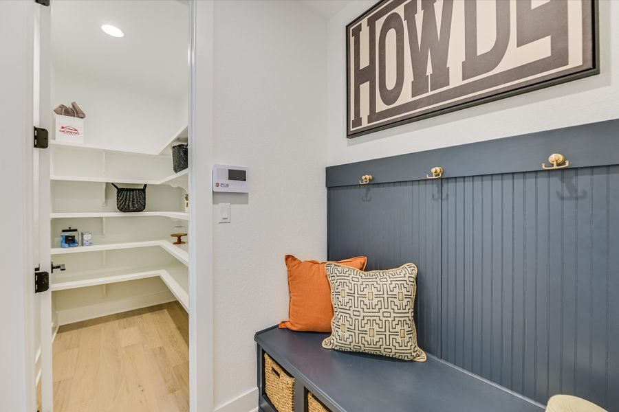 Furnished interior in a model home at Scofield Farms Estates in Georgetown (Image 30).