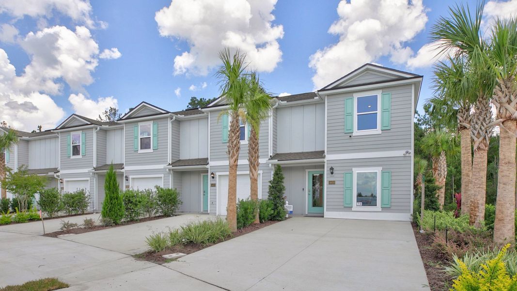 Front exterior of a home in the Bridle Creek Townhomes community, located in Jacksonville, FL (Image 1). Front exterior of a home in the Bridle Creek Townhomes community, located in Jacksonville, FL (Image 1).