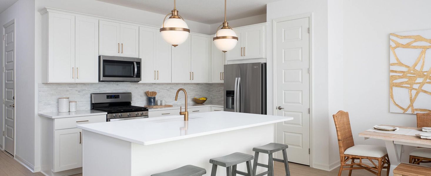 Furnished interior in a model home at The Enclaves at Festival Cove in Davenport (Image 24).