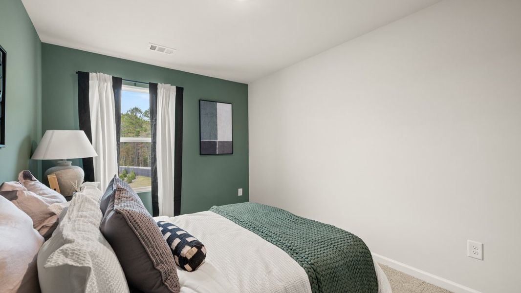 Furnished interior in a model home at Woodbury Park in Atlanta (Image 37).