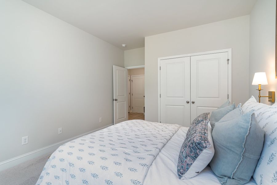 Furnished interior in a model home at Waterbridge in Myrtle Beach (Image 71).