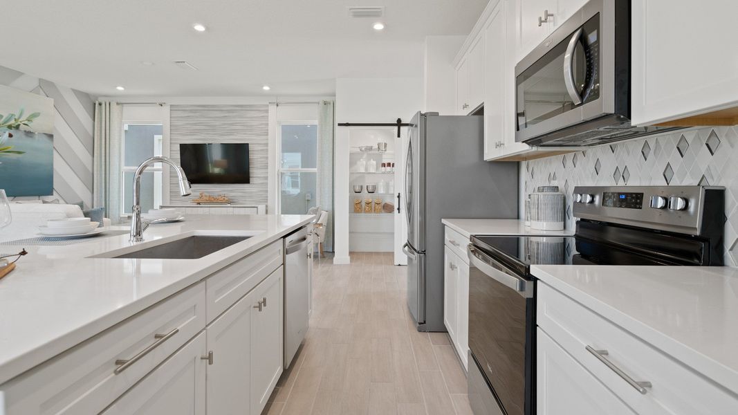 Trinity Place Staged Model Ambersweet Kitchen by DRB Homes in Saint Cloud FL Trinity Place Staged Model Ambersweet Kitchen by DRB Homes in Saint Cloud FL