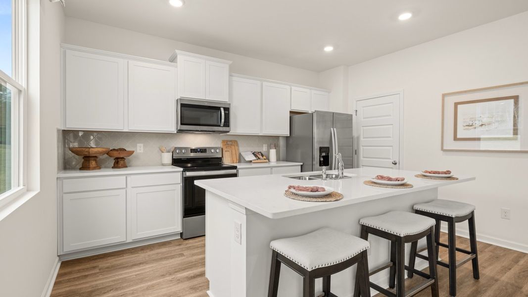 Furnished interior in a model home at Oakchase at Hampton in Hampton (Image 9).