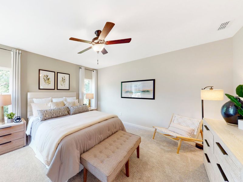 Furnished interior in a model home at Friendship Village Townhomes in Apex (Image 6).