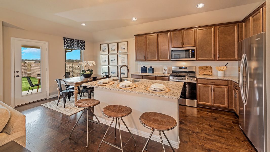 Furnished interior in a model home at Stark Farms in Denton (Image 8).