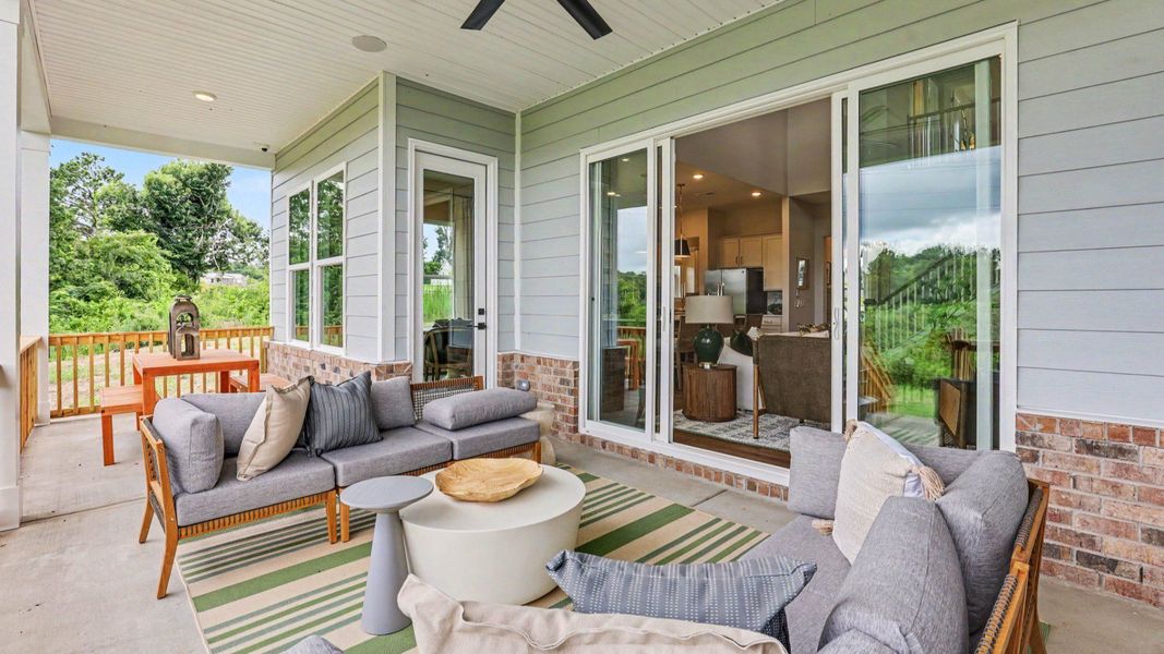Spacious rear covered patio with ceiling fan Spacious rear covered patio with ceiling fan