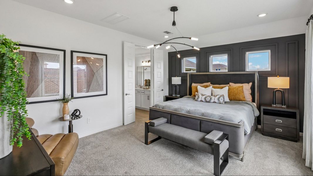 Luxurious bedroom with rich wood accent wall, stylish chandelier, plush carpet in Cypress Green. Luxurious bedroom with rich wood accent wall, stylish chandelier, plush carpet in Cypress Green.