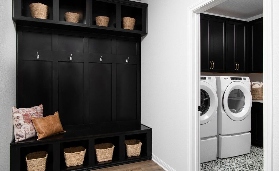 Furnished interior in a model home at Cannon Ranch 45s in Dripping Springs (Image 14).